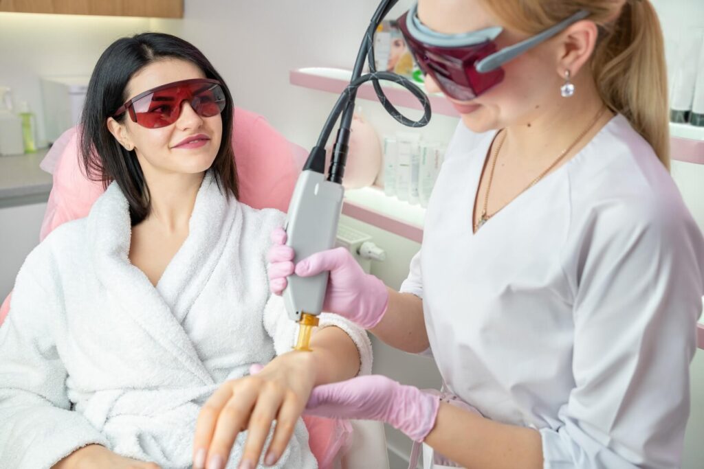 Nashville aesthetician works on laser hair removal patient